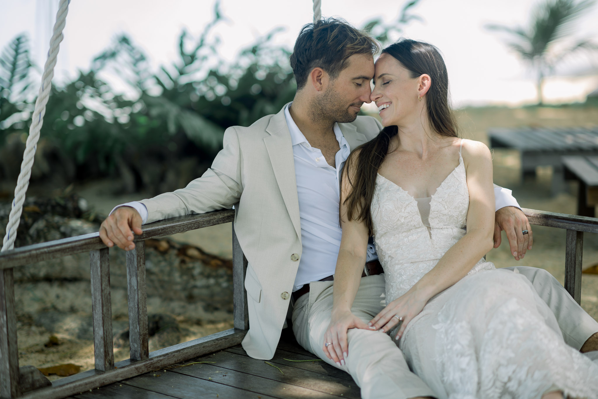 Elegant destination wedding ceremony at an open-air pavilion overlooking scenic mountains and sea, featuring minimalist decor, refined bridal details, intimate vow exchange, and cinematic luxury editorial moments.