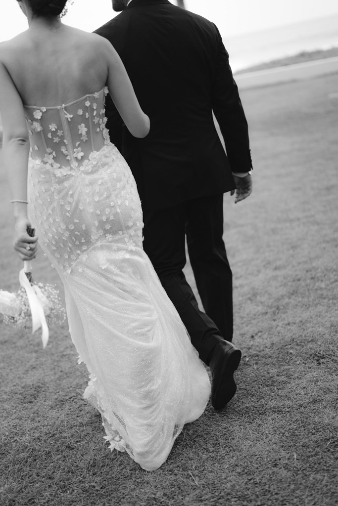Luxury villa wedding portraits in Thailand with bride and groom, elegant outdoor ceremony setting and timeless romantic moments.