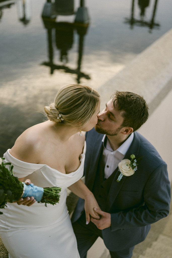 Luxury beachfront wedding with candid and editorial moments of the bride and groom at sunset, romantic portraits, emotional ceremony, and elegant seaside celebration.
