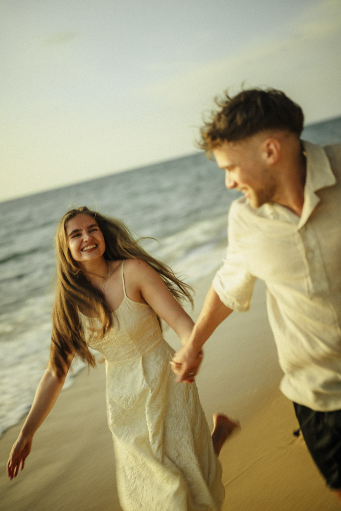 Romantic beach engagement and proposal photoshoot in Phuket Thailand captured by a Phuket photographer at sunset