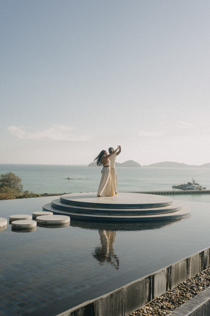 Luxury Phuket proposal and engagement photoshoot captured by a Phuket proposal photographer with romantic beach and resort setting in Thailand